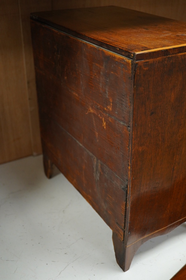 A George III mahogany miniature four drawer chest and key, 40cm high, 35.5cm wide. Condition - good